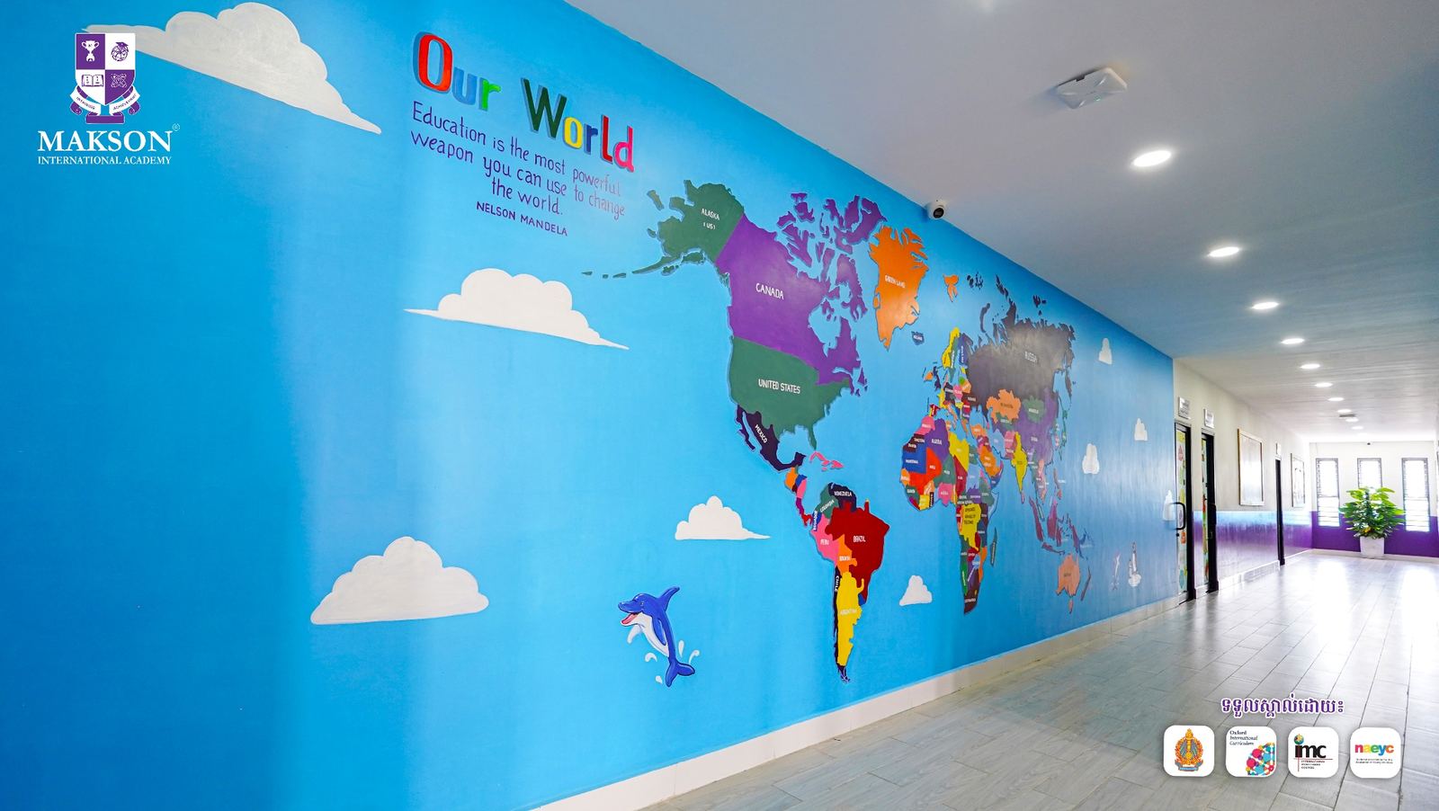 School corridor with world map mural